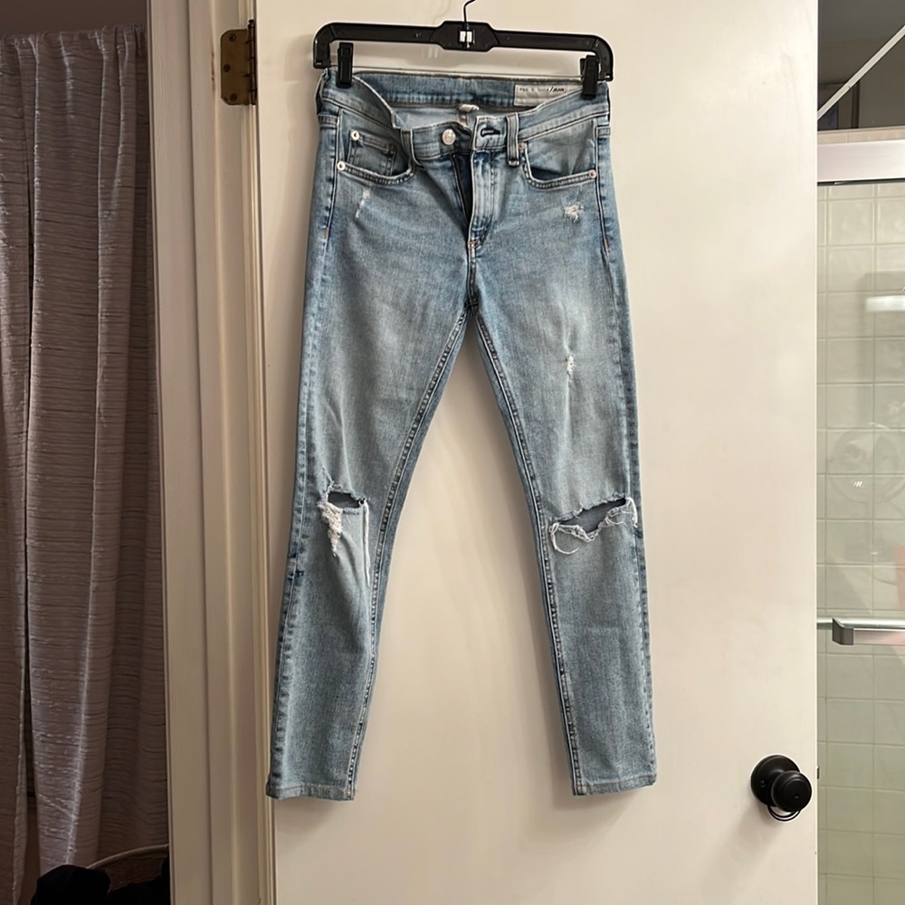 Perfect condition light blue holes in the knees nice stretch.